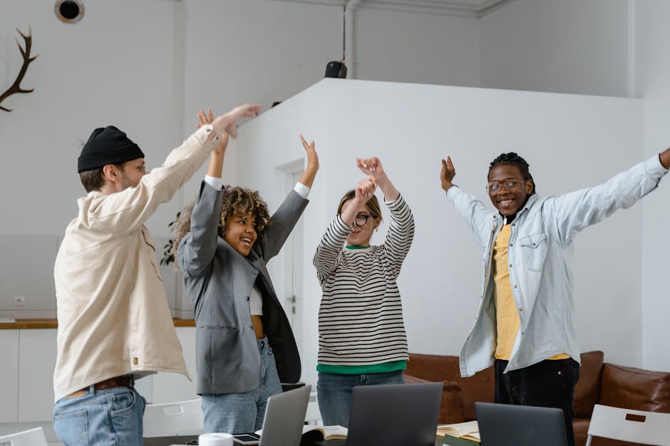 Diverse group of professionals collaborating in a modern East Bay office