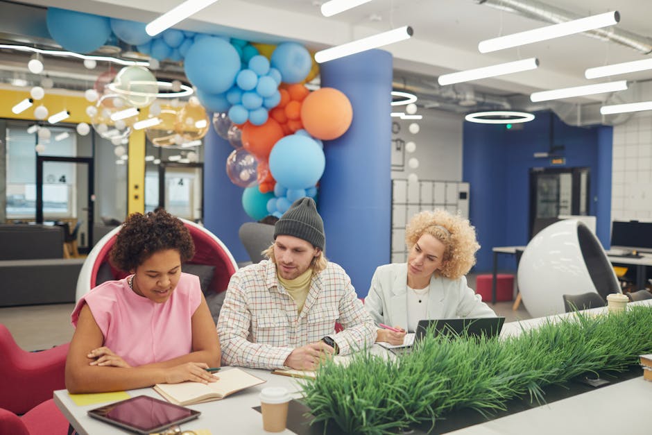 Diverse team collaborating in modern office space