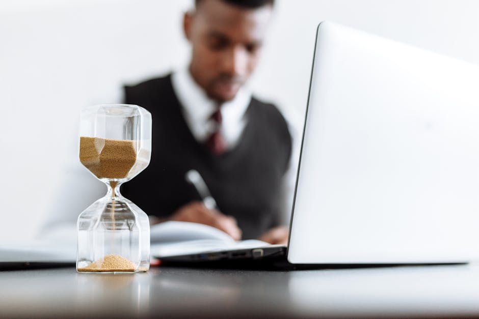 HR manager reviewing flexible working request on computer