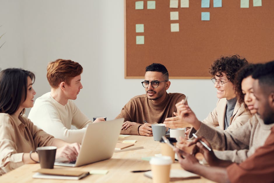 HR professionals in a meeting discussing strategy