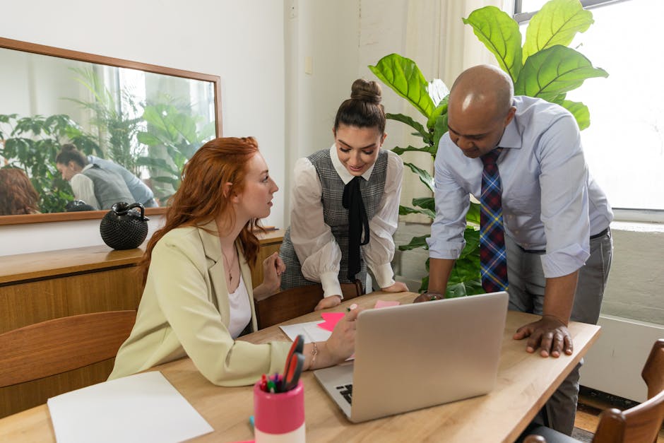 UK office workers discussing flexible working arrangements