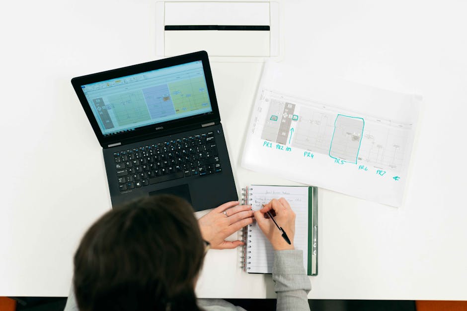 business professionals analyzing workflow diagram