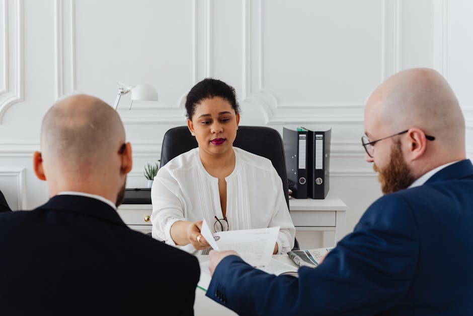 business professionals in a formal meeting room