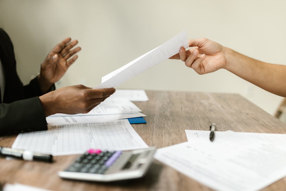 business professionals negotiating lease terms at conference table