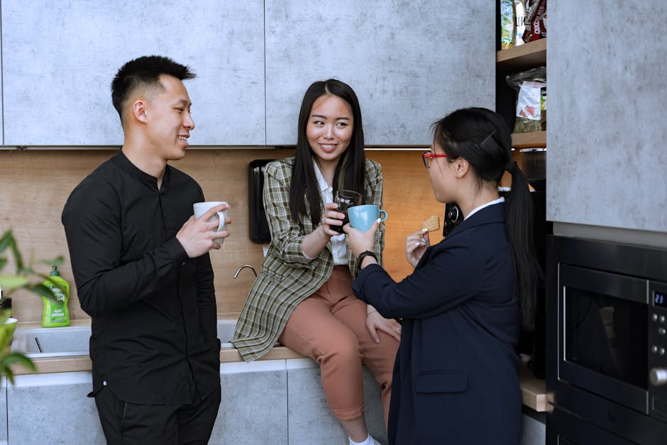 colleagues chatting in office break room