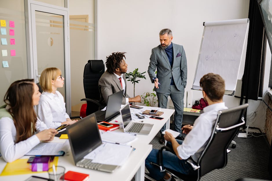 corporate teams collaborating on post-merger integration