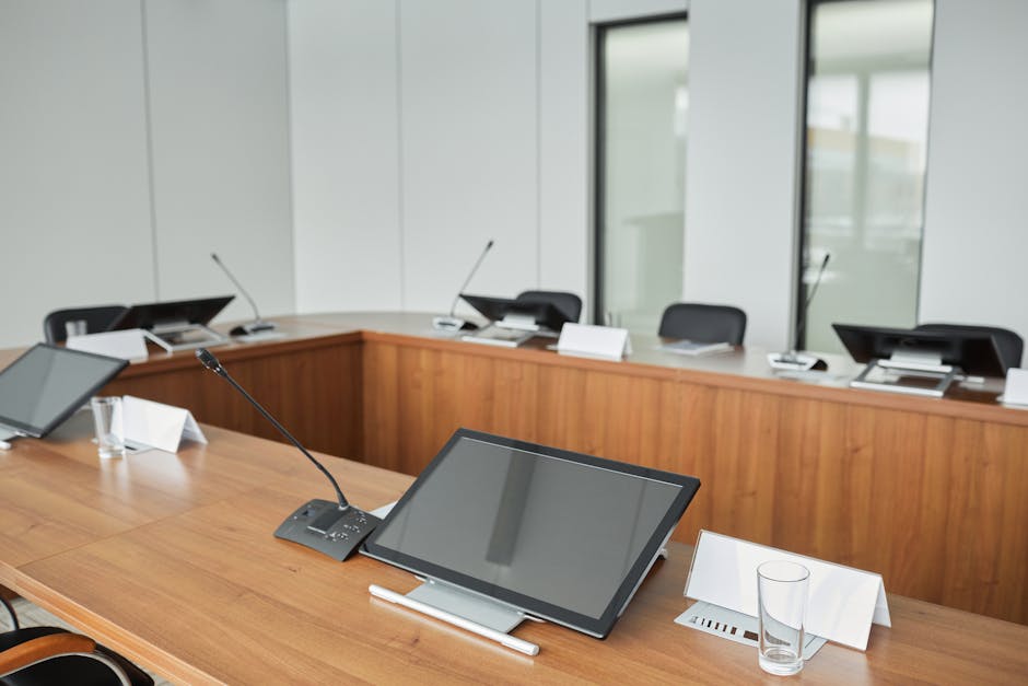 digital display showing meeting room schedule outside office