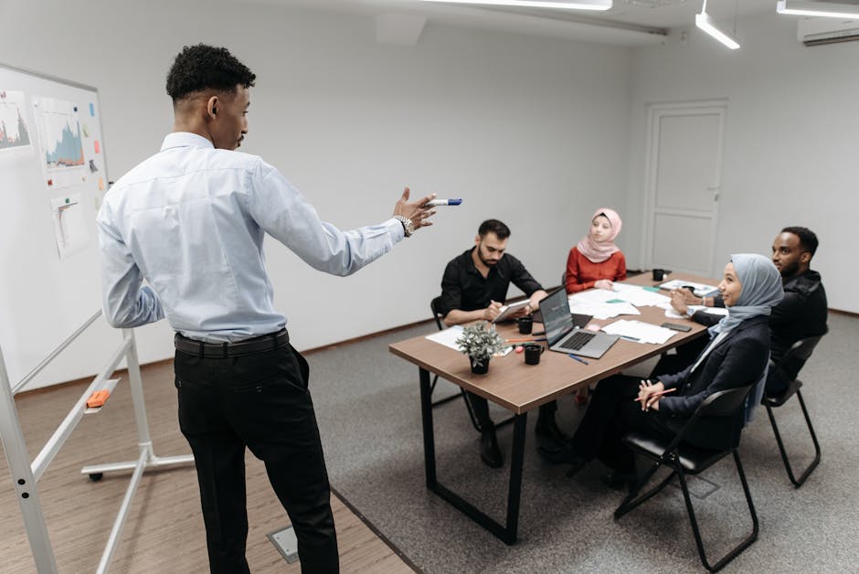 diverse employees collaborating in modern office