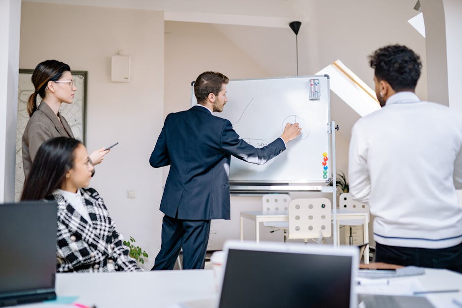 diverse group of employees in a flower-themed meeting room