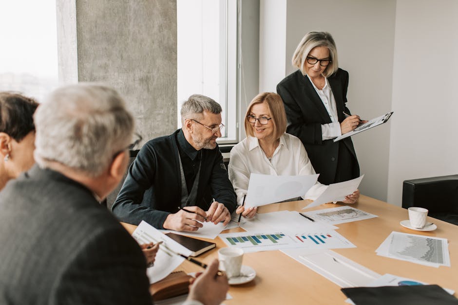 diverse group of employees in office meeting