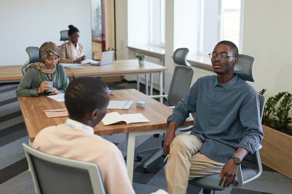 diverse team collaborating in hybrid work setting