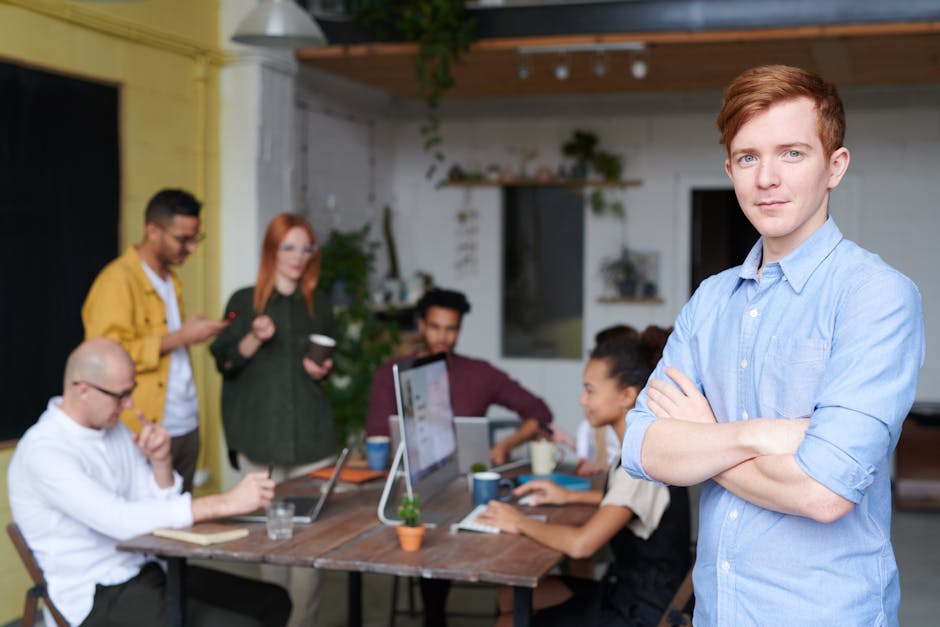 diverse team members collaborating virtually and in-person