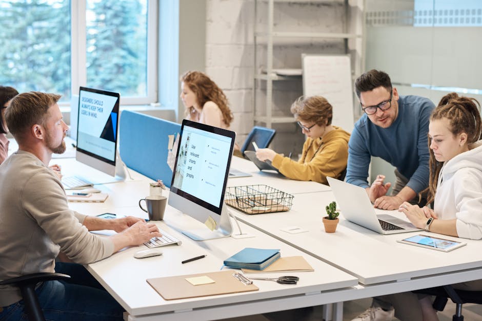 diverse team working at rotating desks