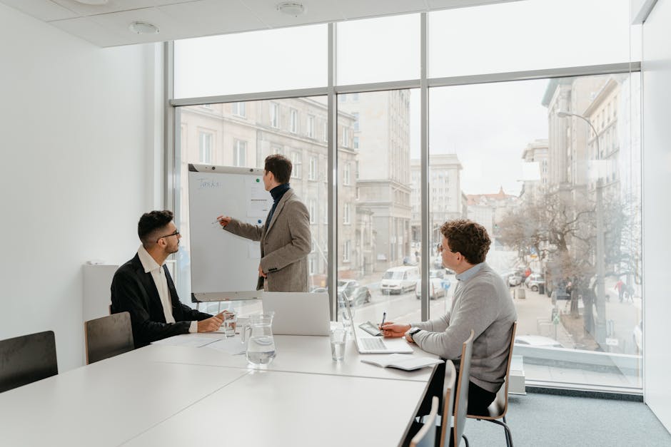 employee leading a team meeting