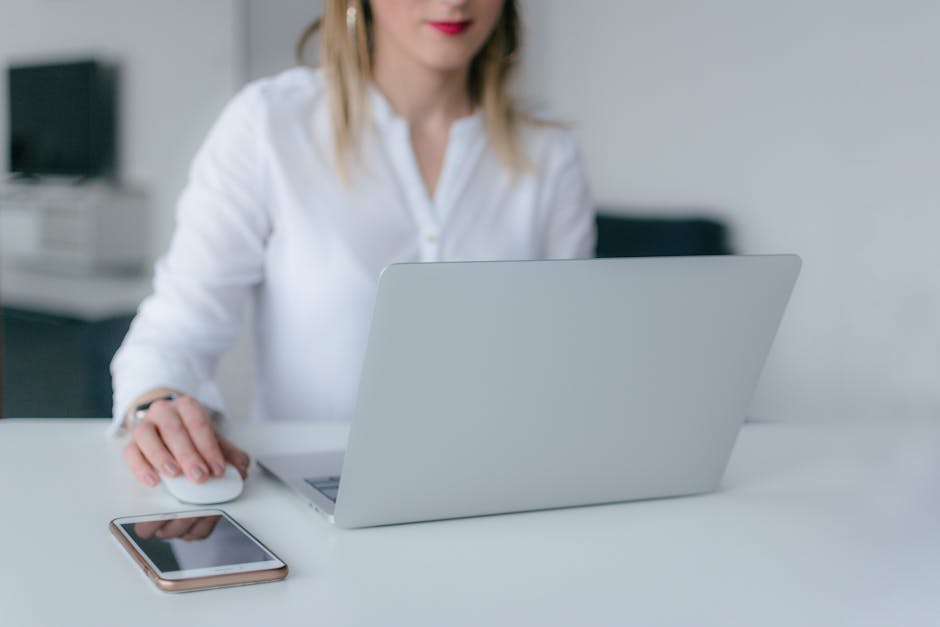 employee reserving desk on smartphone