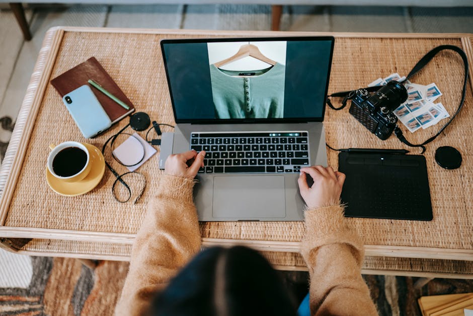 employee using laptop in modern home office setup