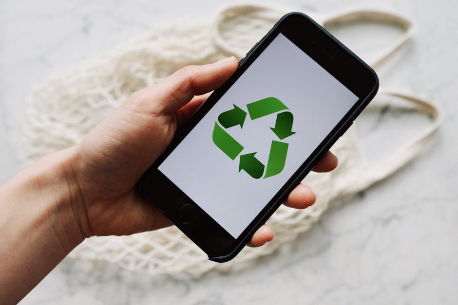 employee using mobile app to track sustainability efforts