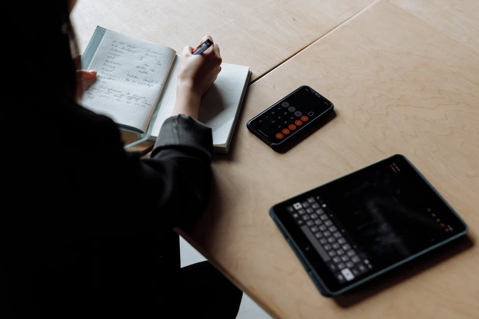 employee using smartphone to check in at office desk