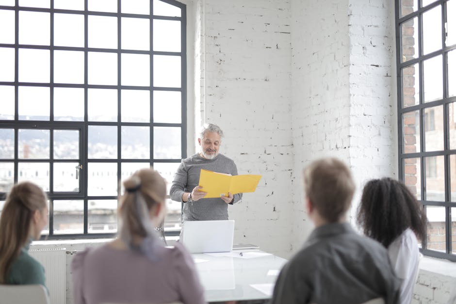 employees and executives collaborating in modern office space