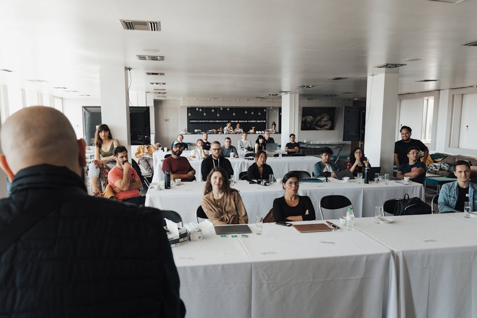 employees engaged in a collaborative workshop or meeting