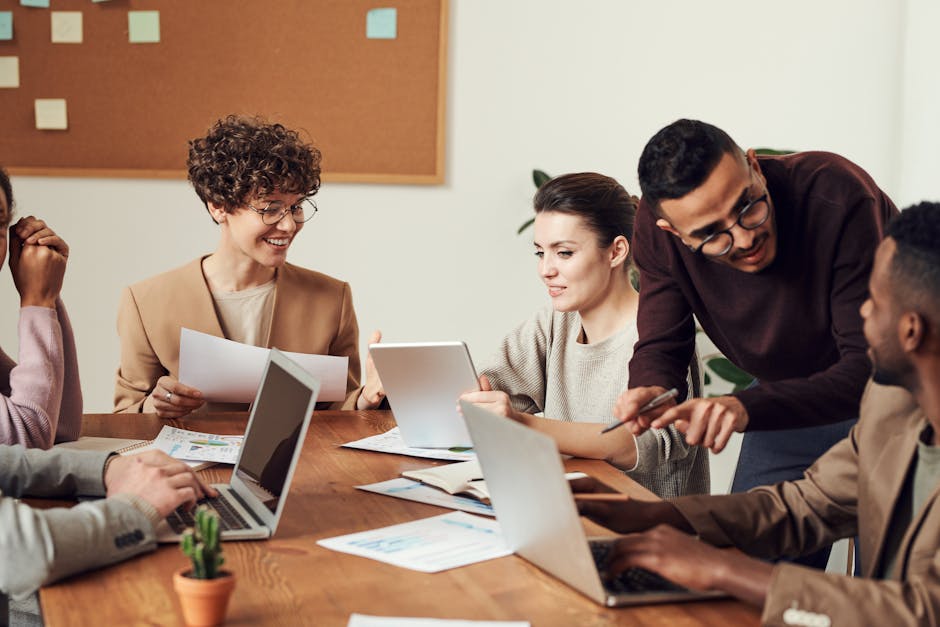 employees in a meeting discussing change