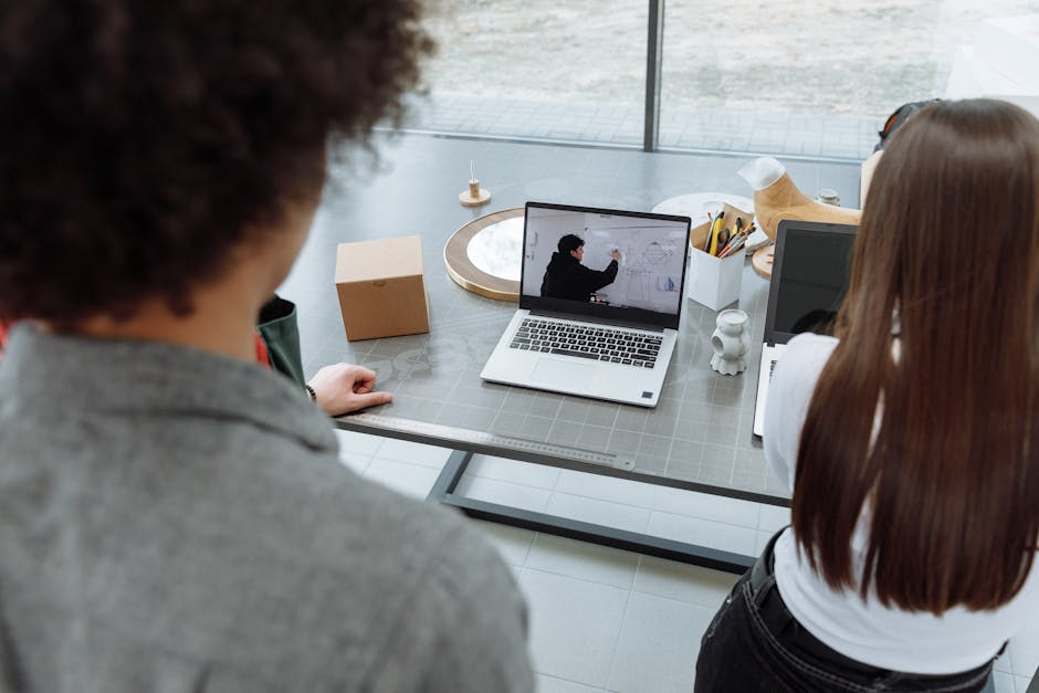 employees in hybrid meeting with some remote participants