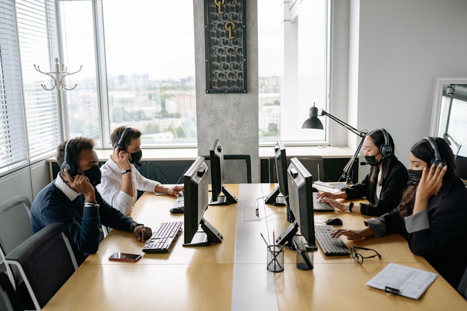 employees working at hot desks