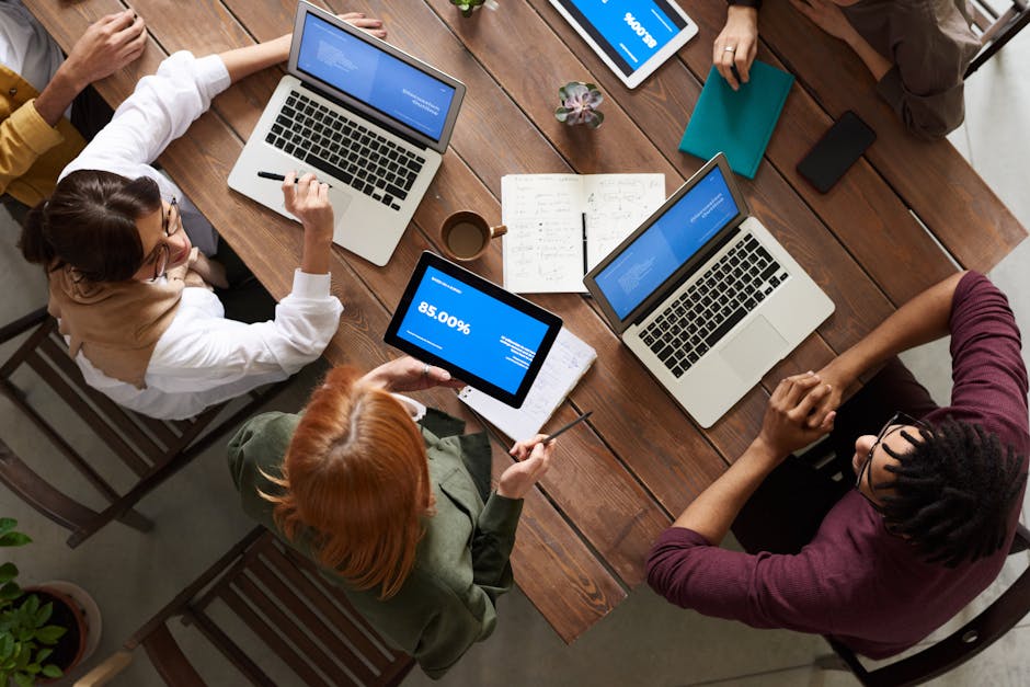 employees working in a hybrid office setting