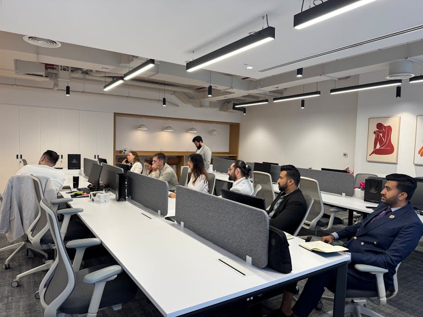 employees working in modern flexible seating office space