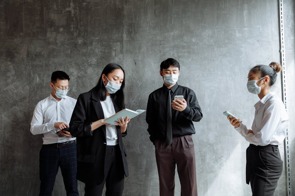 employees working in socially distanced office