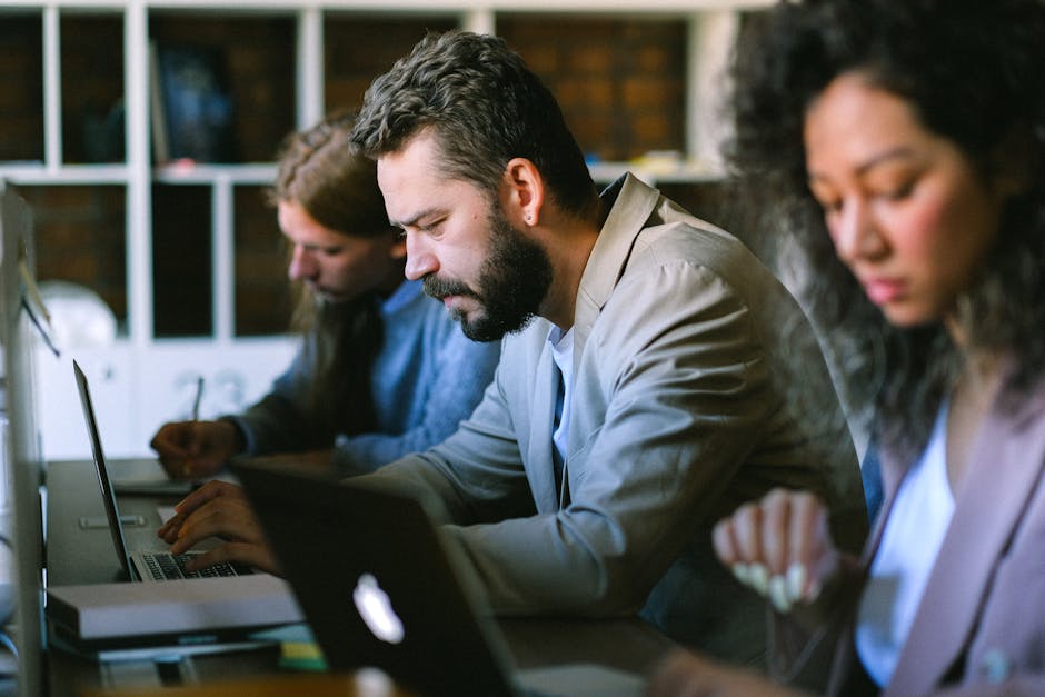 engaged employees collaborating in modern office