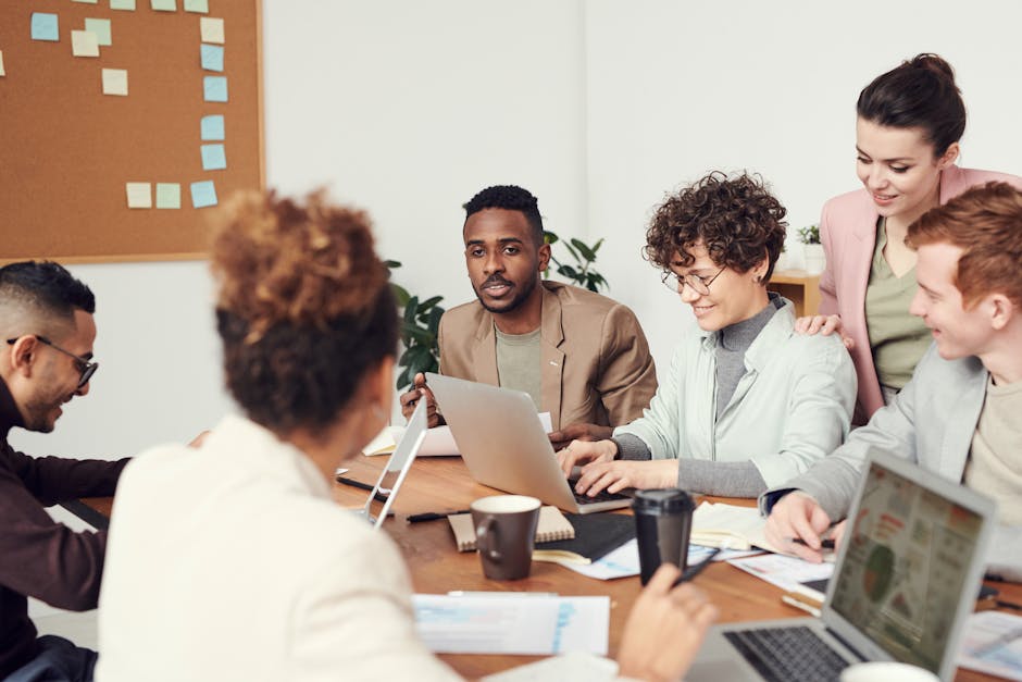 executives in meeting discussing workplace policies