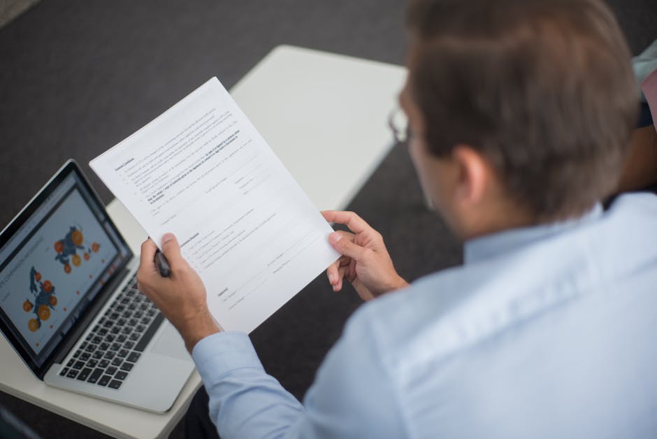 facility manager reviewing data on computer screen