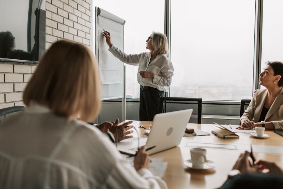 federal employees collaborating in office