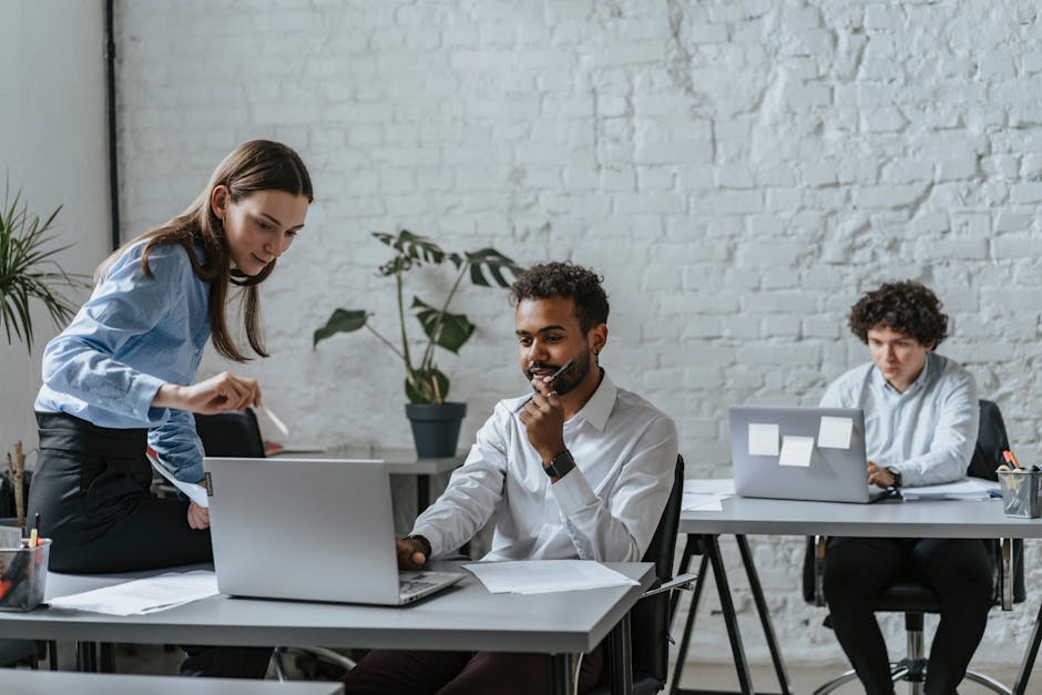 happy employees collaborating in office