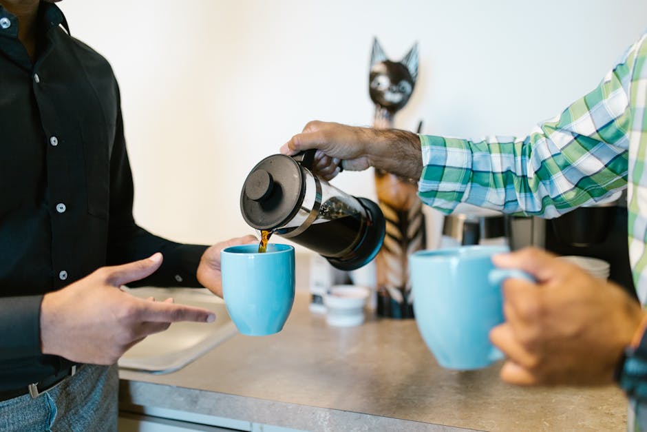 large office kitchen with multiple coffee stations