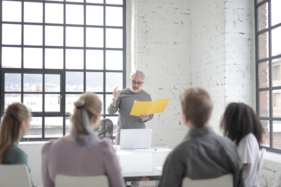 leader presenting company vision to team