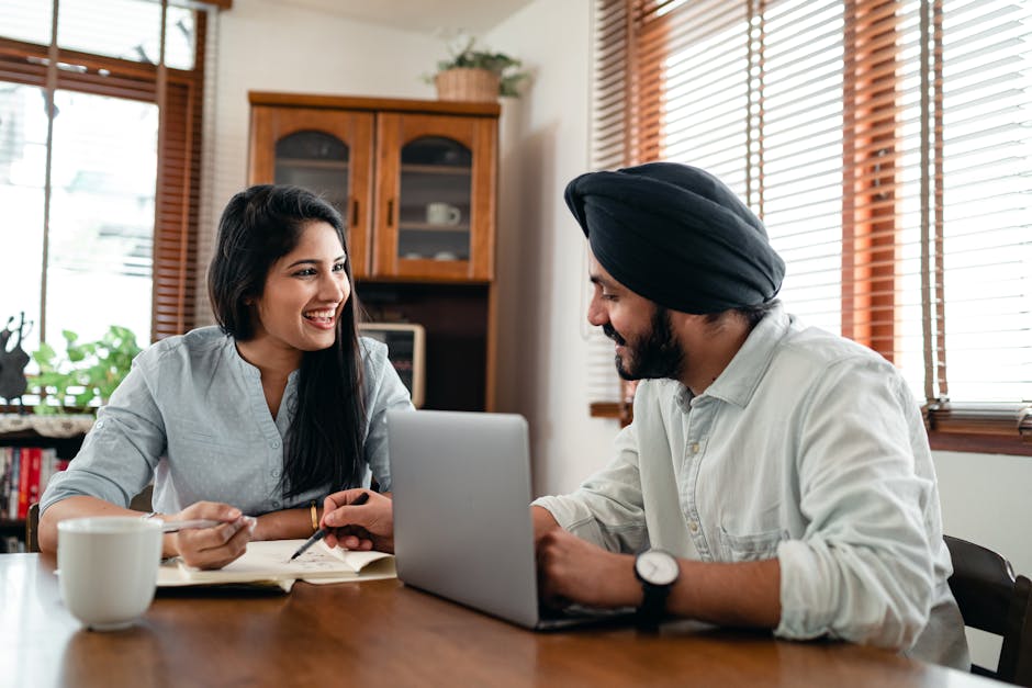 manager discussing project with in-office and remote team members