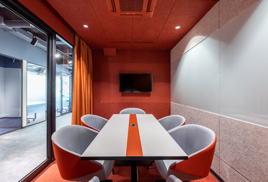 modern conference room with colorful chairs and inspiring wall art