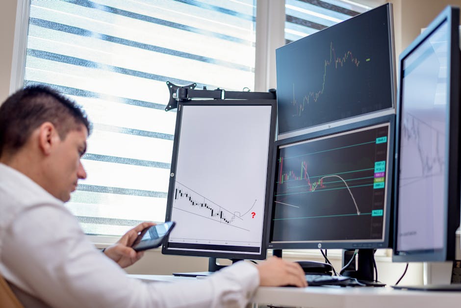 office workers analyzing data on screens