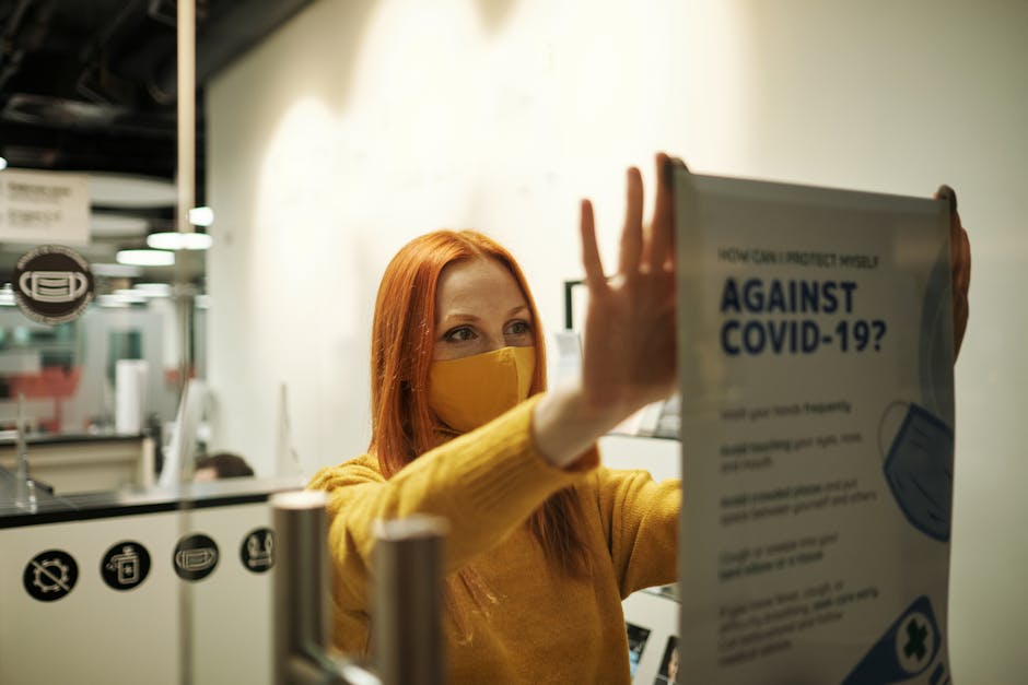 office workers wearing masks and maintaining distance