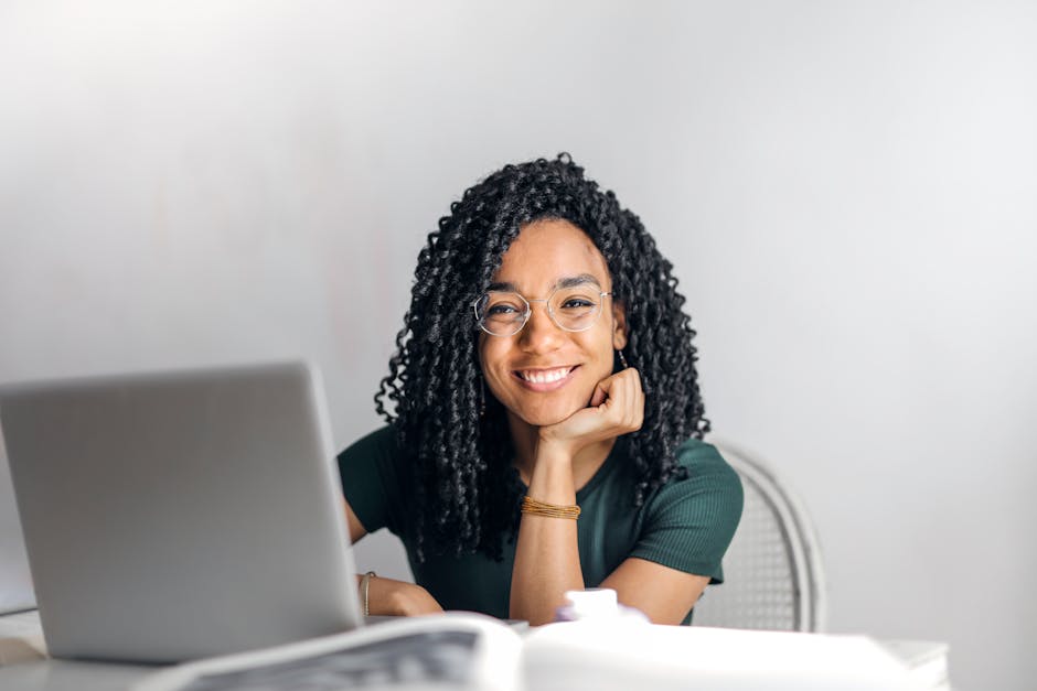 person managing digital signage content on computer
