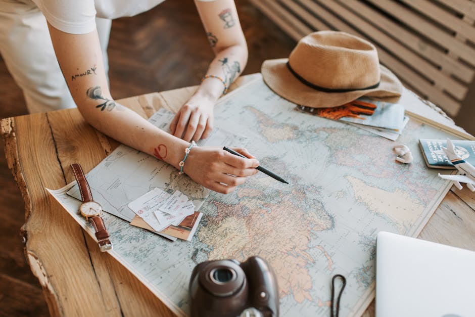 person planning vacation on laptop