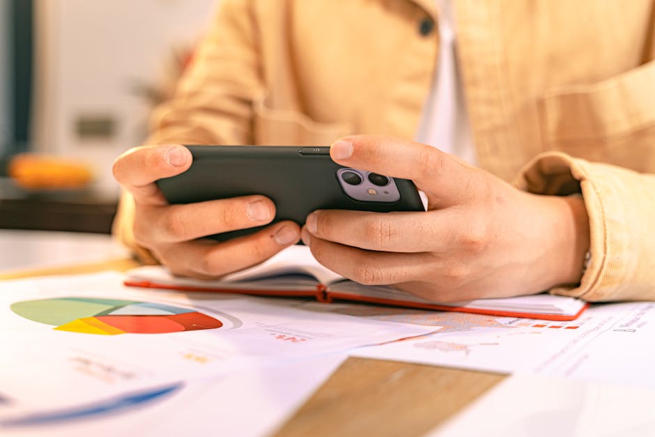 person reading workplace announcement on mobile device