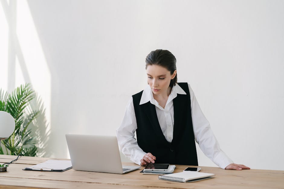 person using multiple devices for work