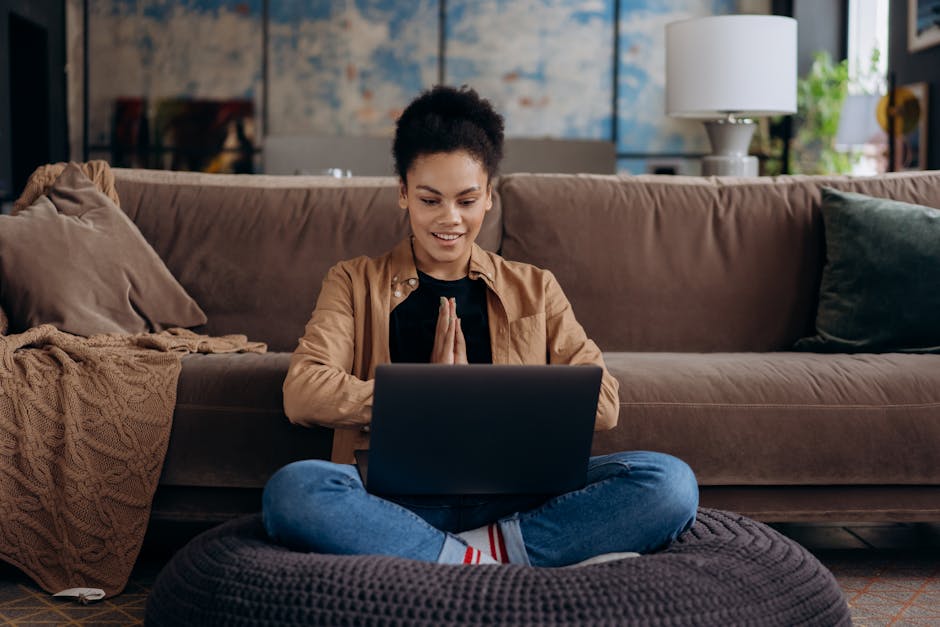 person working on laptop in home office