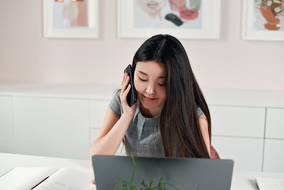 person working remotely with office in background