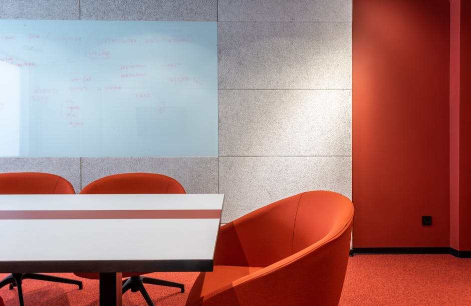 spacious conference room with standing-height table and stools