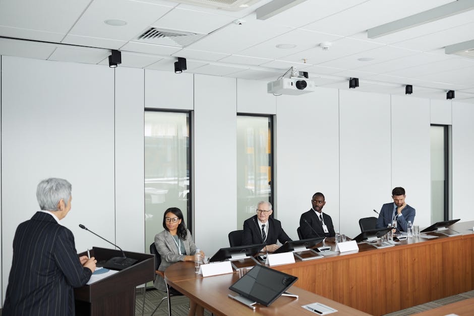 team leader facilitating a meeting with engaged participants