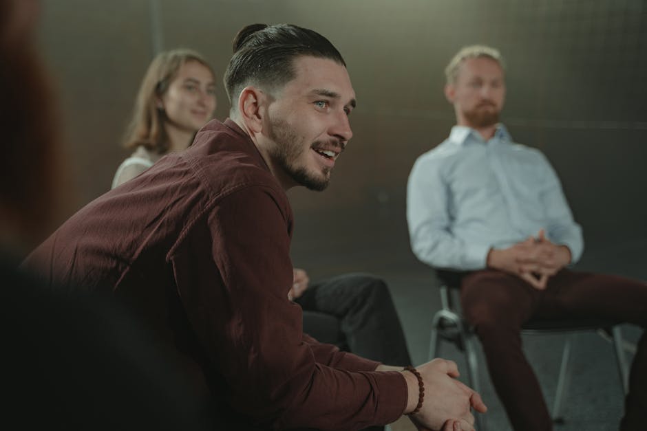 team meeting with in-person and virtual participants